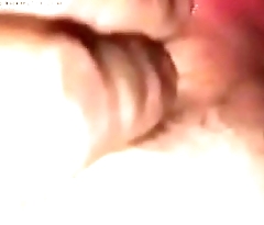 Playing with herself and cumming
