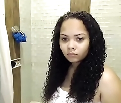 Latina woman taking shower live show